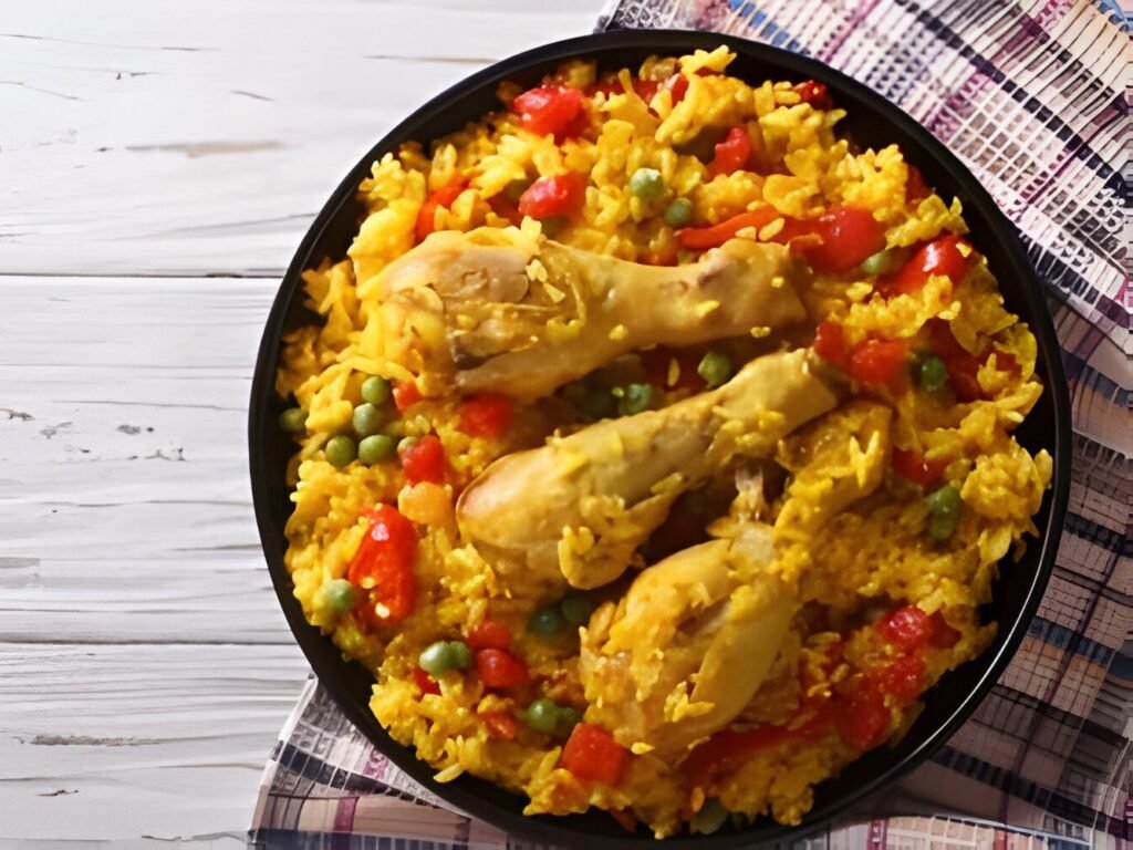 Learn how to make a flavorful and satisfying chicken and yellow rice dish with this easy-to-follow recipe. Perfect for busy weeknights!