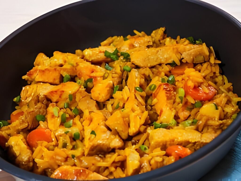 Learn how to make a flavorful and satisfying chicken and yellow rice dish with this easy-to-follow recipe. Perfect for busy weeknights!